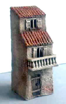 Three Story House with Ornate Balcony