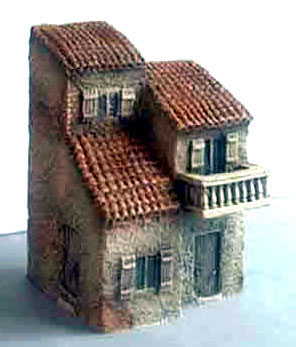 Double Three Story House with Ornate Balcony