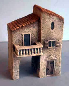 Building with Archway & Wooden Balcony