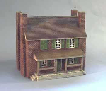 3 Story Brick House with 4 Chimneys, Shuttered Windows and Veranda with Tiled Canopy