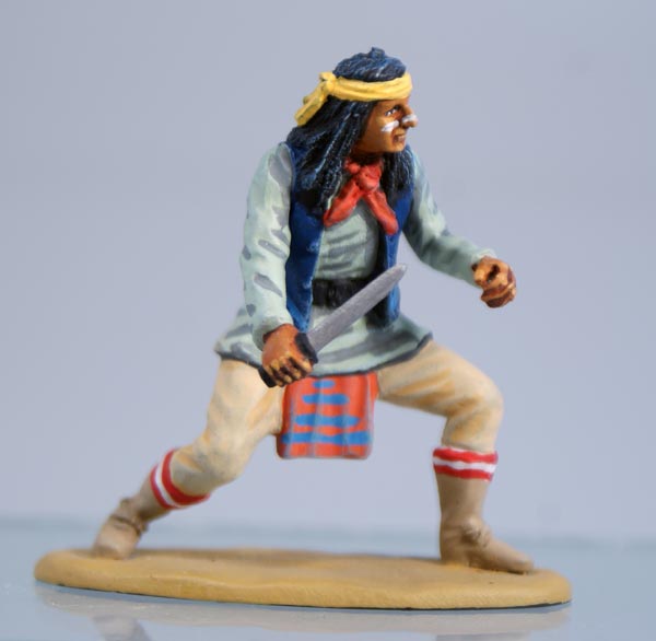 Apache in Bandana Crouching With Knife