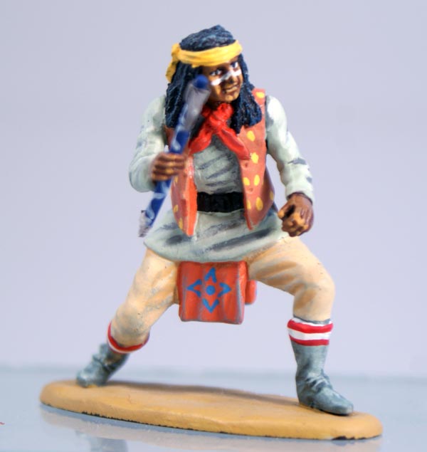 Apache in Bandana Crouching With Tomahawk