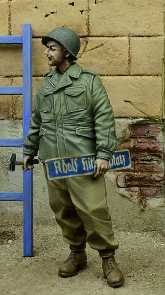 US GI holding Street Sign Germany 1945