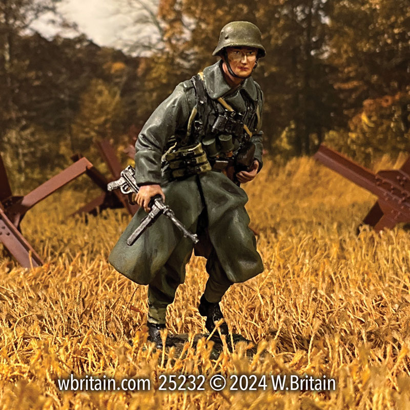 German Grenadier NCO Running in Greatcoat With MP 40 1941-45