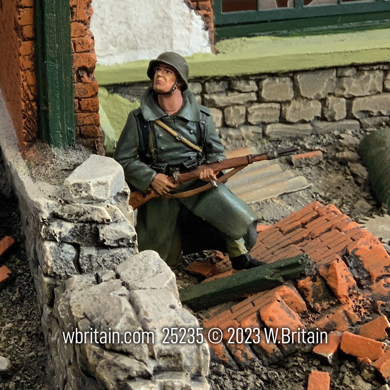 German Grenadier in Greatcoat Kneeling Looking Up