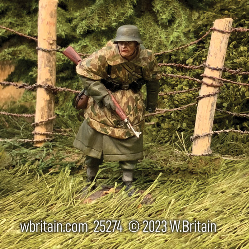 German Grenadier in Greatcoat and Zeltbahn Advancing Cautiously Winter 1944-45