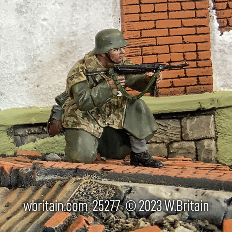 German Grenadier Kneeling Firing MP40 in Zeltbahn and Greatcoat Winter 1944-45