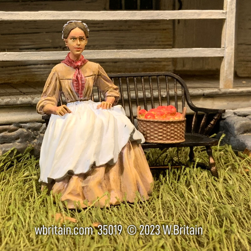 Emily Lost in Thought Young Woman Sitting on Bench