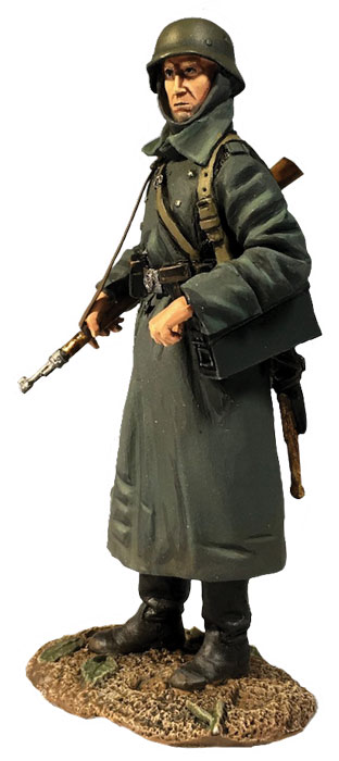 German Volksgrenadier Standing with Ammo Can in Greatcoat
